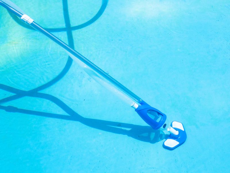 Vacuuming Pool Floor